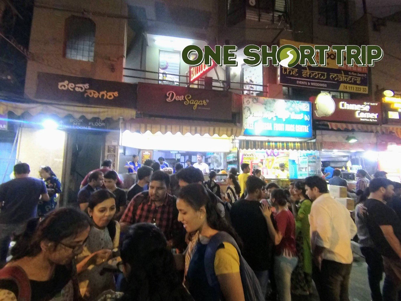 Evening crowd and food stalls along VV Puram Chat Street, Bengaluru