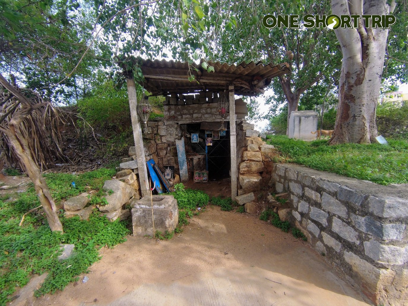Weathered stone shrine and remnants near Begur Fort, South Bengaluru