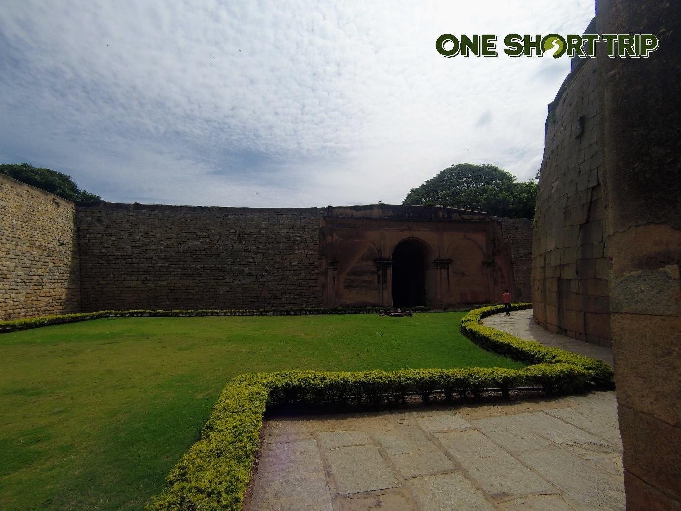 Delhi Gate of Bangalore Fort with garden lawns
