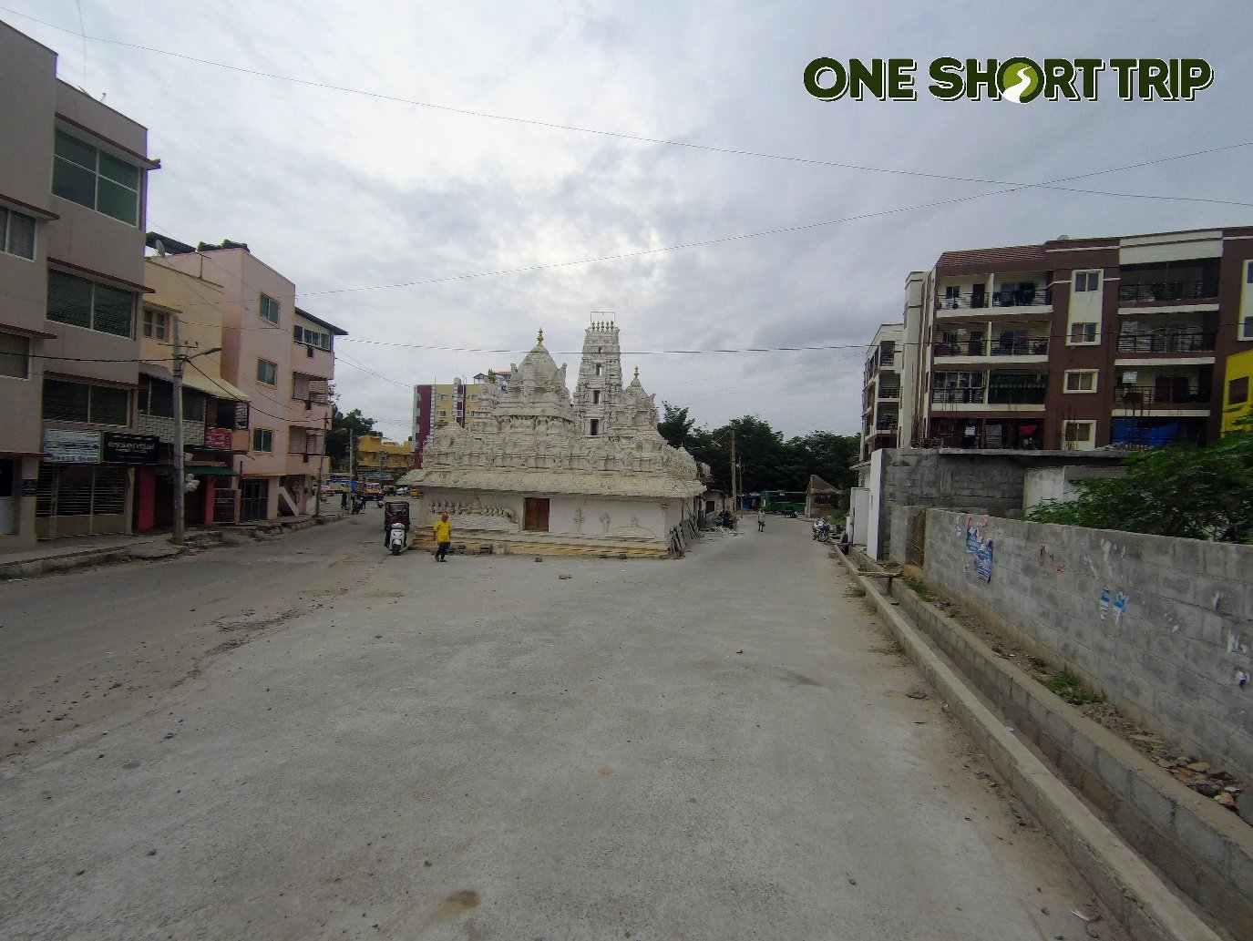 Street view of the white shikhara of Sri Satyanarayana Temple, Hulimavu, Bengaluru