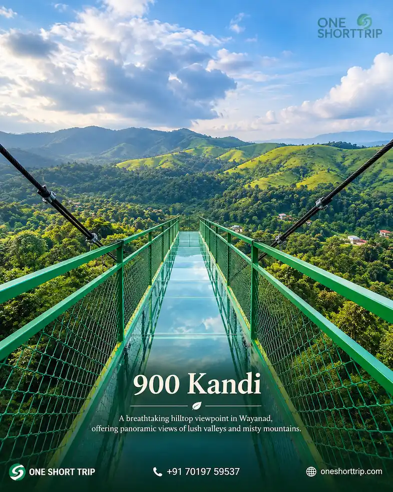 900 Kandi Glass Bridge surrounded by forested hills in Wayanad